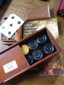 A Boxed set of `Patience` and Drafts with playing board, together with a copy of a selection of