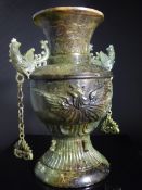 An Important Archaic Chinese Jade Urn, believed to be crafted in Burmese Jade of baluster form