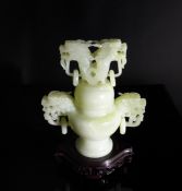 Chinese 20th Century Celadon Jade Censer, The censer having lion mask and ring handles with twin