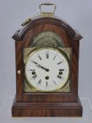 A Knight & Gibbins Chiming Mantle Clock being mahogany cased, the face being white with black