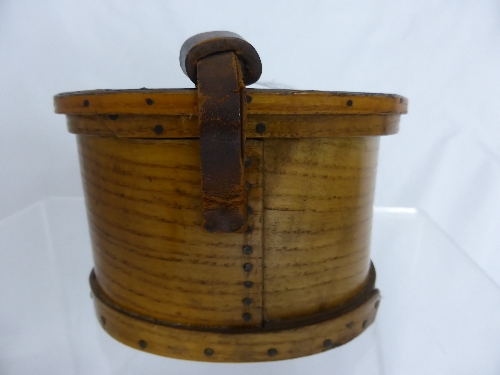 Wooden Lidded Oval Box with a leather strap possibly to store shirt collar stiffeners.