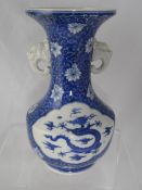 Chinese blue and white vase having handles in the form of dragons with chasing dragon and lotus