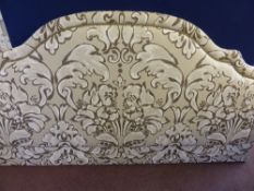 An upholstered headboard having decorative foliate design of cream, brown and white approx. 195 cms.