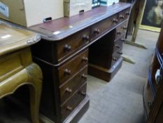 A Victorian Twin Pedestal Mahogany Leather topped Desk, each pedestal having three drawers, the