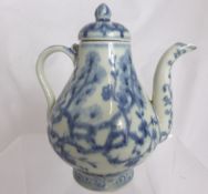 Chinese blue and white Xuande teapot depicting lotus blossoms with marks to the rim, approx. 15