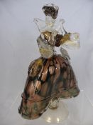 A Murano Glass Figure of an Elizabethan lady 31 cms high, metallic finish with gold inclusions.