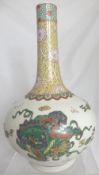 Chinese famille rose style long neck Guangxu vase depicting dragons, the vase having character marks