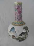 Chinese famille rose long necked onion vase having a painted frieze depicting a mountain and lake