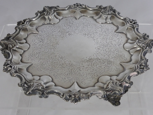 A Victorian Solid Silver Card Tray, the tray having an ornate scalloped edge depicting flowers and