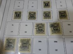 A carton of Polish ( with Danzig ) and Czechoslovak stamps in albums and packets incl. some