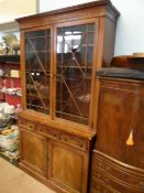 An Antique Glazed Front Bookcase having three drawers and two cupboards below, approx. 132 x 221 x