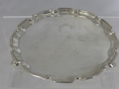 A Solid Silver Card Tray with scalloped edge on scroll feet, Chester hallmark, dated 1931 / 32, mm S