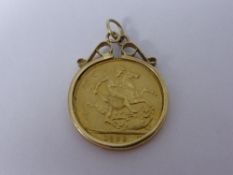 1898 half gold sovereign in a mount