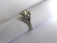 A Lady`s 18ct platinum and diamond solitaire ring, 1.36 ct. size M