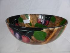An H&K Tunstall Fruit Bowl hand painted with plums together with a Poole Pottery Plate and trinket