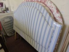 An upholstered head board being of corn flower blue stripe approx 153 cms.