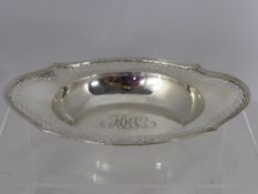 A Solid Sterling Silver Fruit Basket having a shaped lattice edge, stamped The Bailey. Banks &