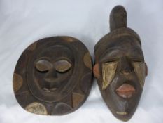 Carved Nigerian Hand Painted Face Mask, of a female with carved figure to top together with a hand