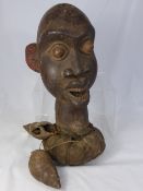 Antique West African Shrine figure, the carved wooden figure head depicting a warrior. The head on a