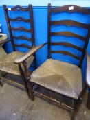 Two Oak High Back Country Kitchen Chairs together with two Dining Chairs with reeded seats.