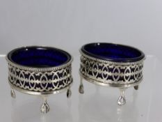 A Pair of Solid Silver Table Salts having lattice edges on ball and claw feet, London hallmark, 1931