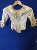 Lady`s Silk and Lace Bodice together with various embroidered linen including runners, tablecloths