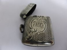 Solid Silver Vesta Case, Birmingham Hallmark, dated 1900, engraved central cartouche FH.