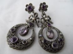 Pair of silver metal pearl and mauve stone Indian earrings together with a lady`s vintage Tissot