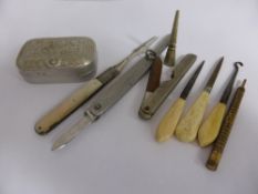 Collection of Masculine Items including stainless steel pocket knife, button hook, mother of pearl