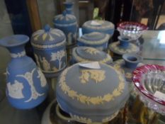 Wedgewood Jasper Ware comprising Bud Vase, Candlestick Holder, Two Lidded Trinket Dishes and a