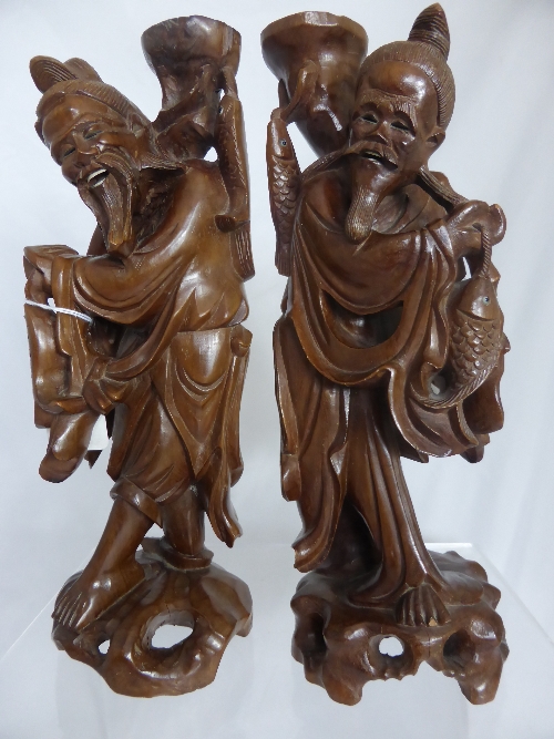 Chinese Root Carvings depicting fishermen and their catch, 30 cms h. (2)