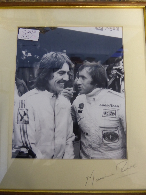 Jackie Stewart - Black and White Photograph signed by the photographer Maurice Rowe .