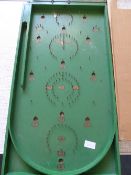 A vintage Bagatelle board together with a Boots Company Shove Ha`penny board complete.