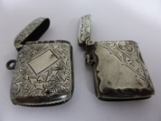 Two Solid Silver Vesta Cases, one with a Birmingham hallmark, dated 1906/07. (2)