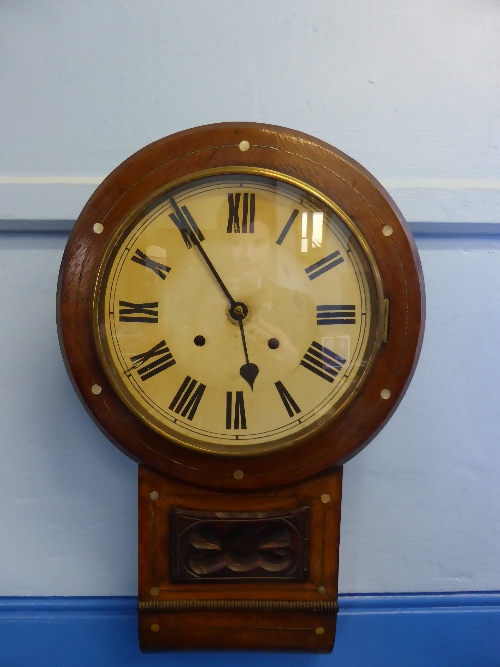 Mahogany Wall Clock, the clock with mother of pearl inlay features an enamel face with Roman