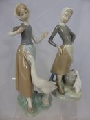 Two Lladro Porcelain figures of young women with duck and geese, 25 and 23 cms respectively.