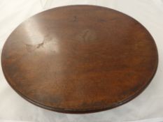 A Victorian Mahogany "Lazy Susan" on pad seats 40 cms in diameter.