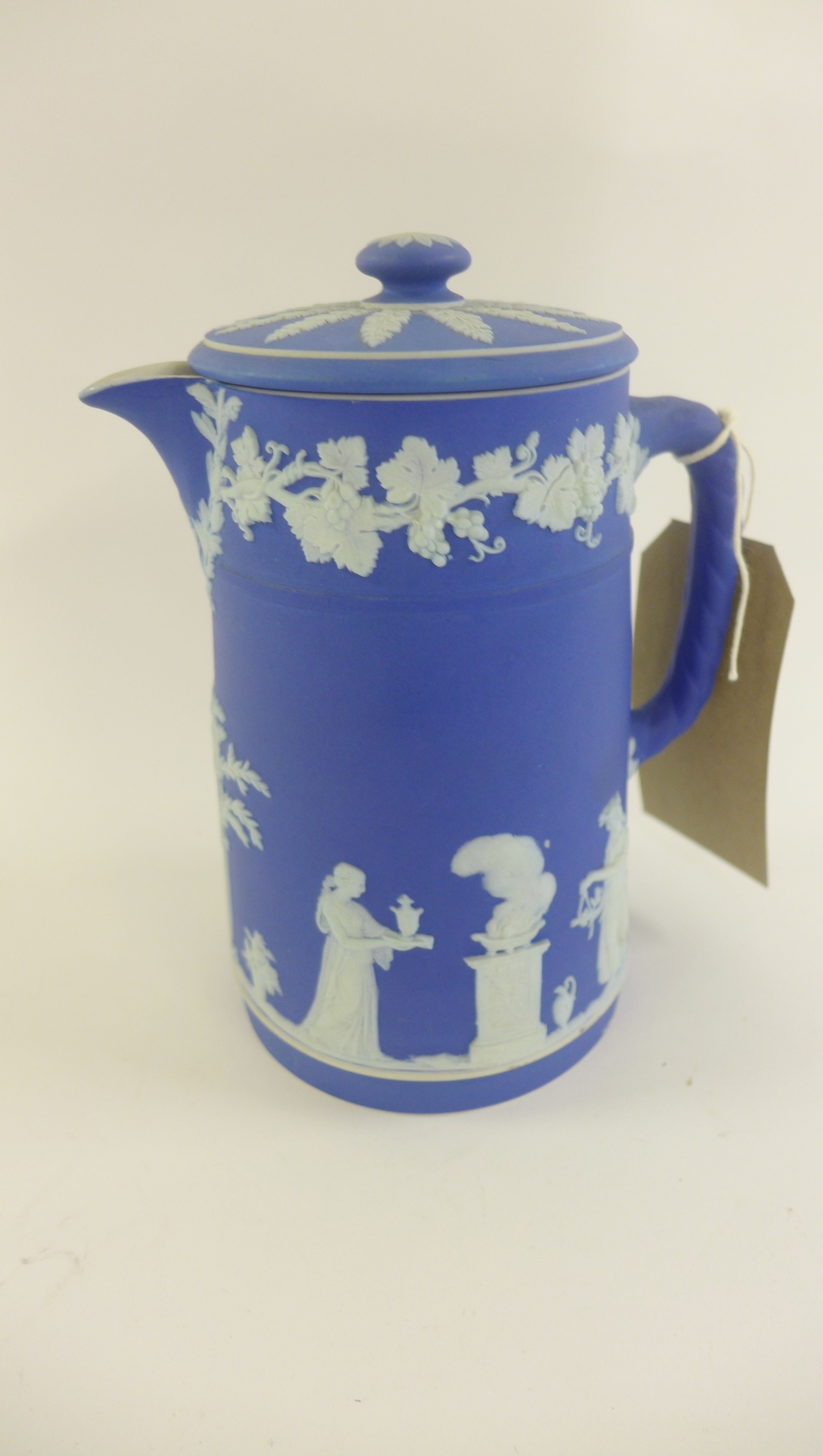 Wedgwood blue Jasper ware hot water pot and lid with Classical Maidens and fruiting vine sprigged