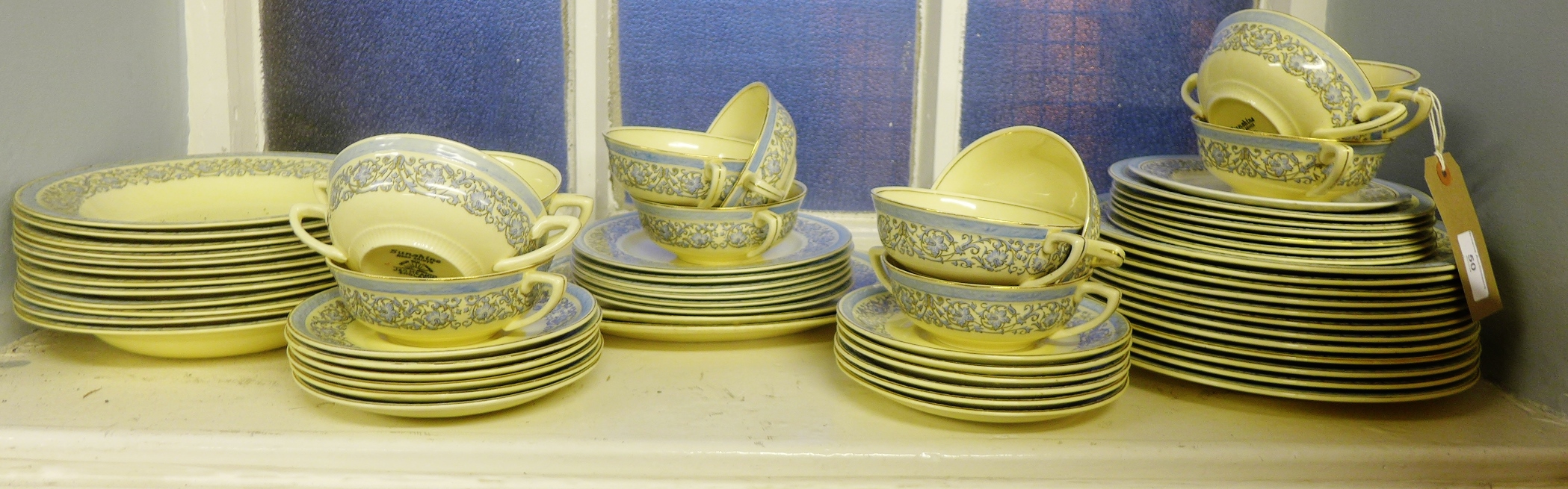 J & G Meakin Sunshine pattern dinner wares to include twelve dinner plates, twelve bowls, twelve