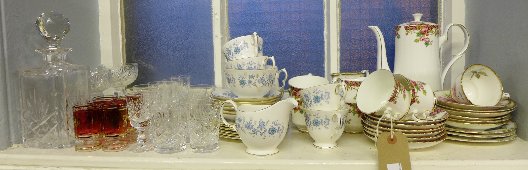A mixed lot to include china teasets, a spirit decanter and miscellaneous glasses