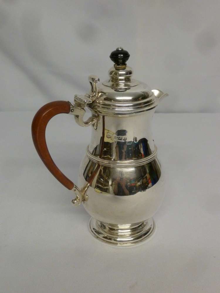 Silver coffee pot in early 18th century style on raised circular base, finial replaced, Birmingham