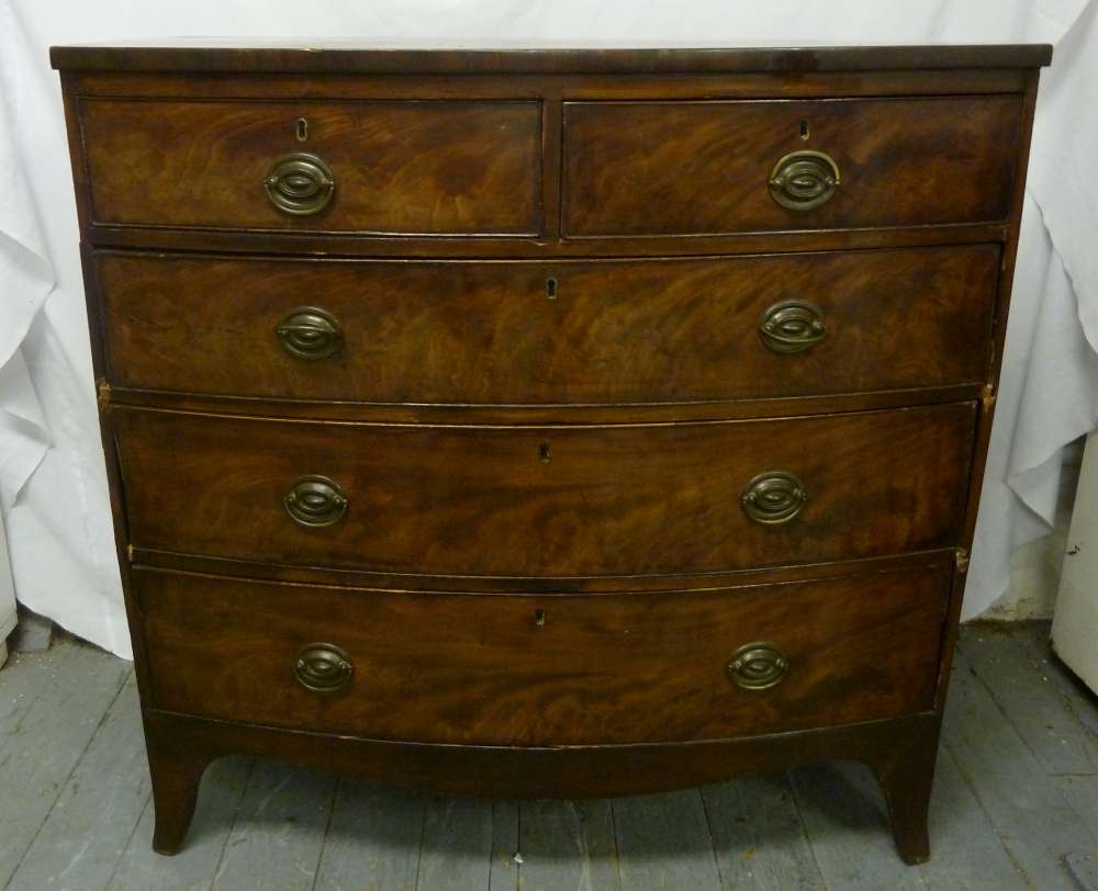 Victorian mahogany bow fronted chest of drawers, two over three with brass handles - A/F