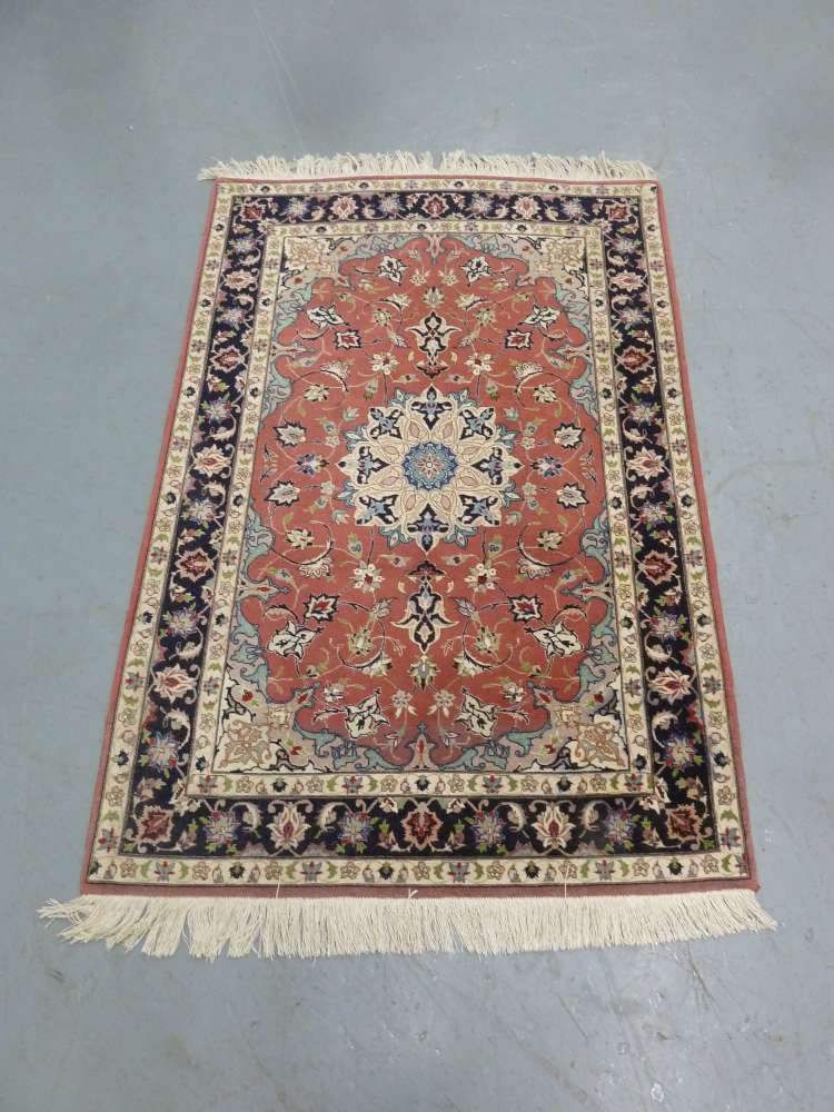 Persian wool carpet with red and blue geometric borders around a central circular medallion - 157 x