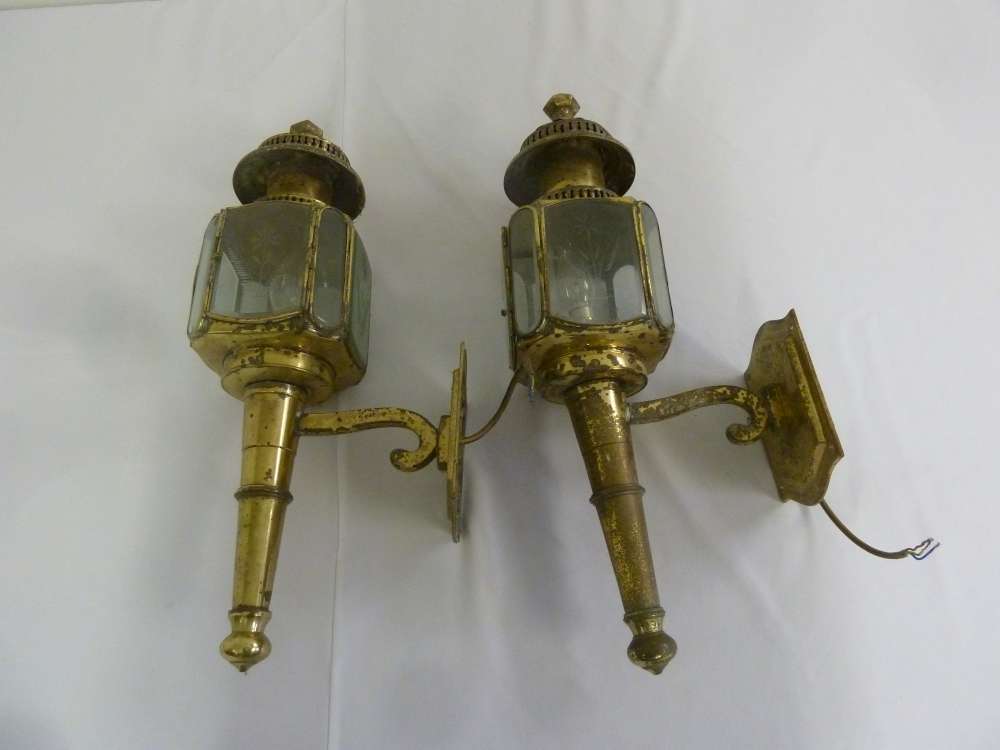 Pair of brass and glass carriage style wall lights