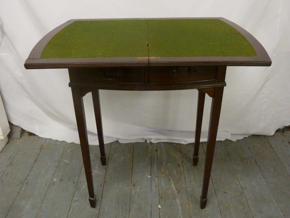 Reproduction mahogany card table on four tapering legs with spade feet