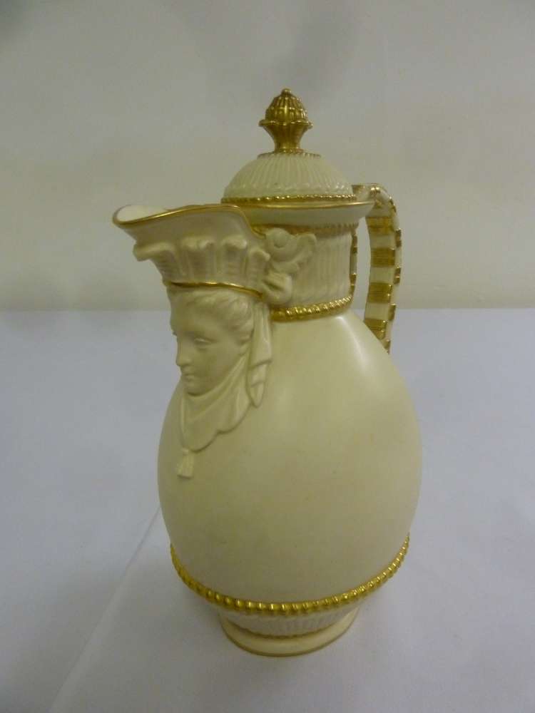 A Royal Worcester Blanc de Chine classical style jug with gilt highlights