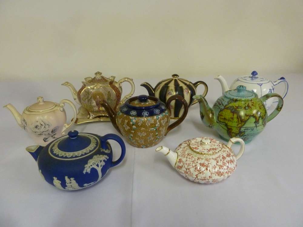 Eight porcelain teapots, to include Wedgwood, Foley, Doulton and Royal Copenhagen
