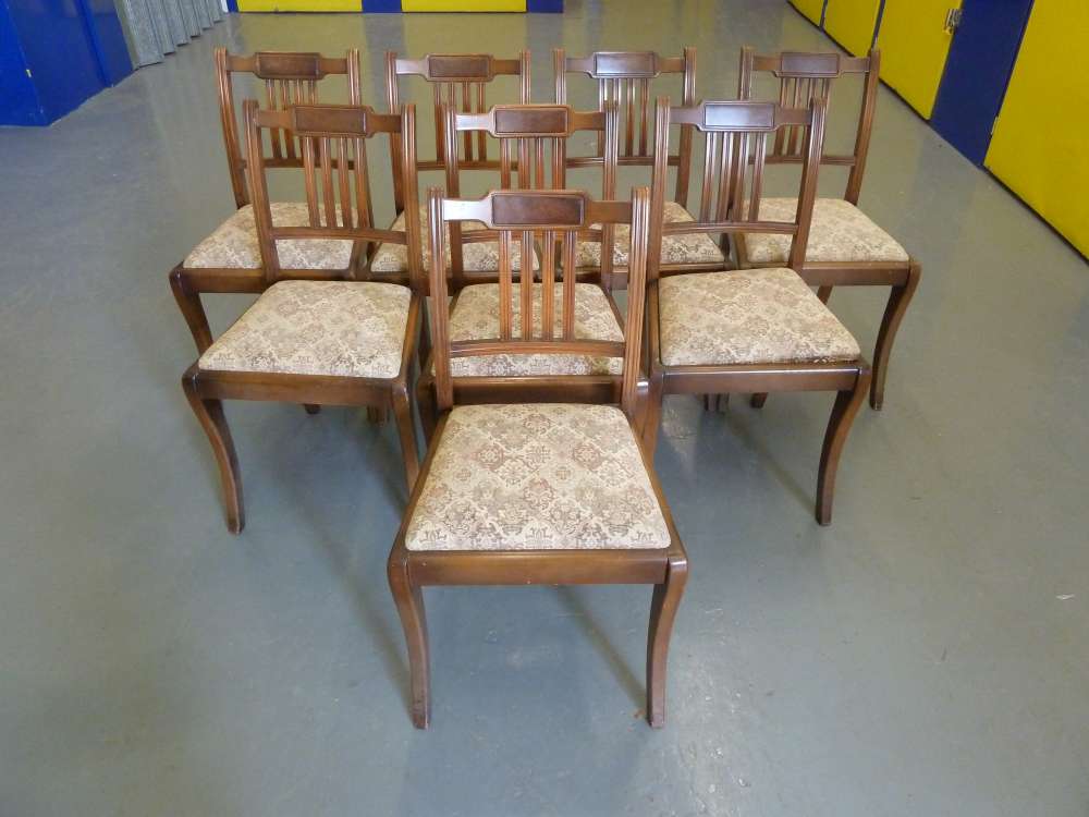 Eight mahogany upholstered dining chairs