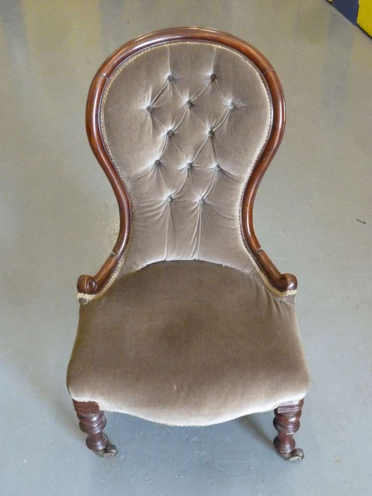 A Victorian mahogany button back nursing chair