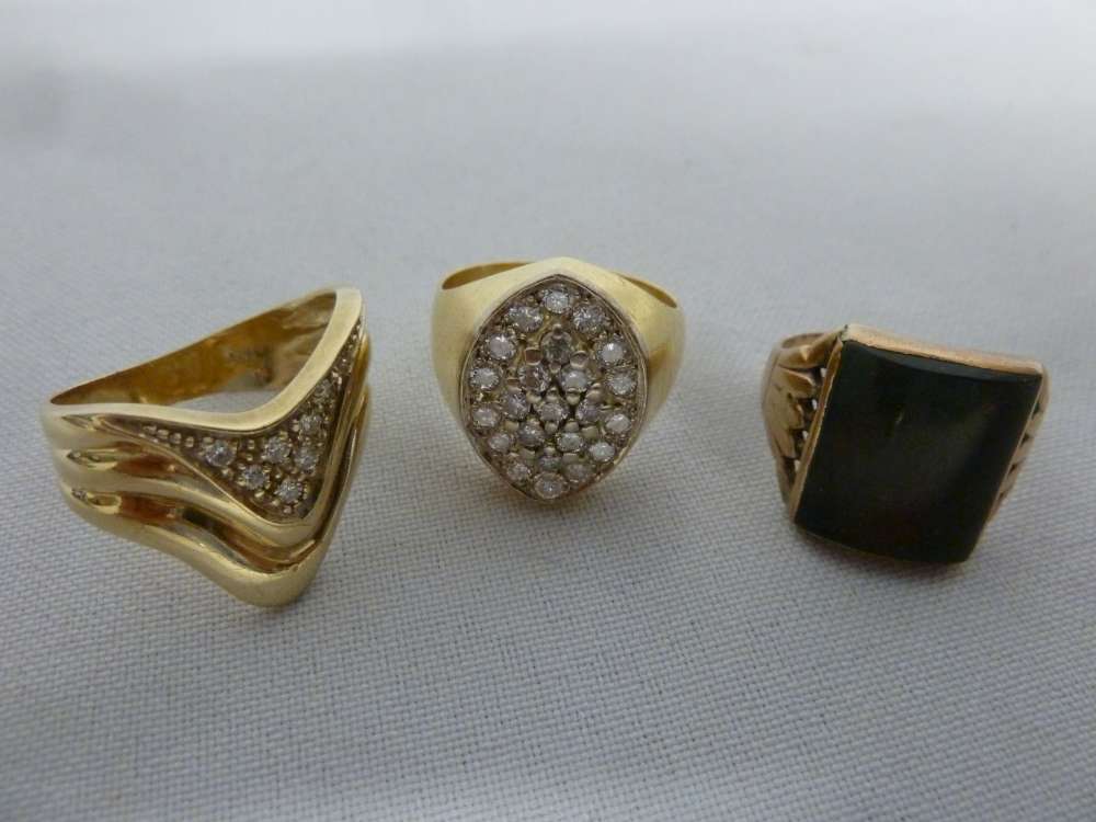 Two 18ct gold and diamond rings and a 9ct signet ring with rectangular bloodstone